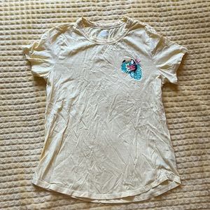 women’s fit yellow shirt with tucan detail